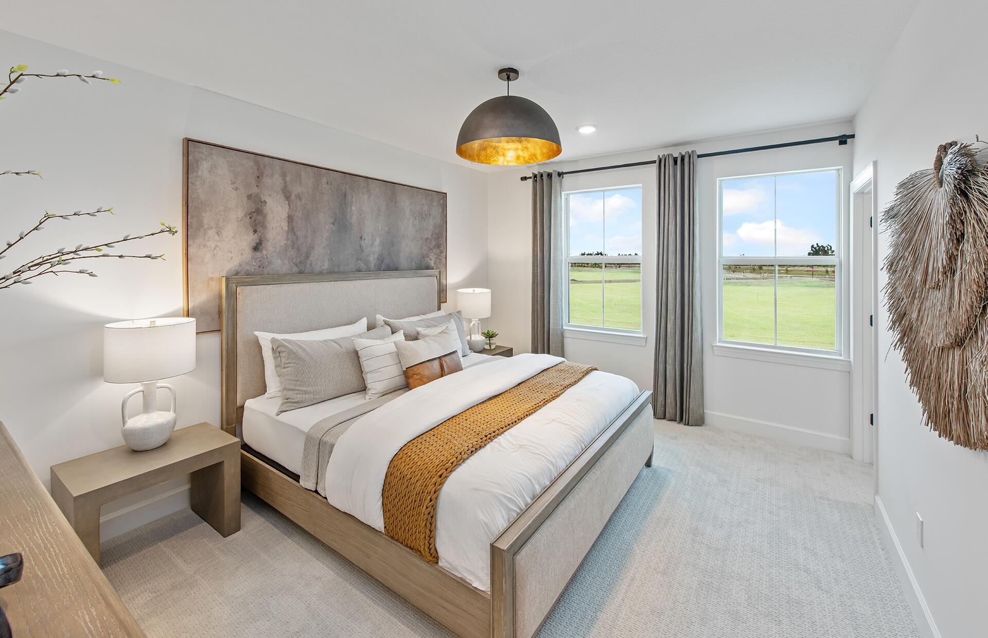 4573 Nautilus Circle Vero Beach, FL 32967 - Photo 16 of 28 a bedroom with a bed and a window