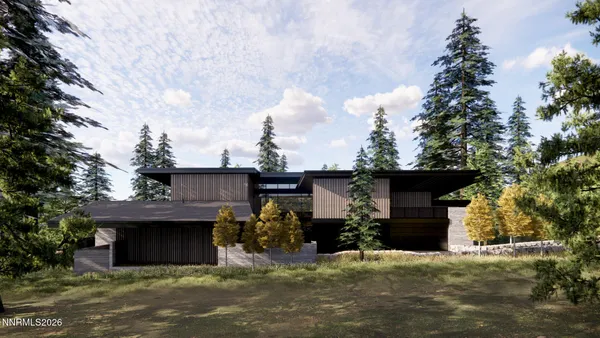a view of a house with a yard and garage