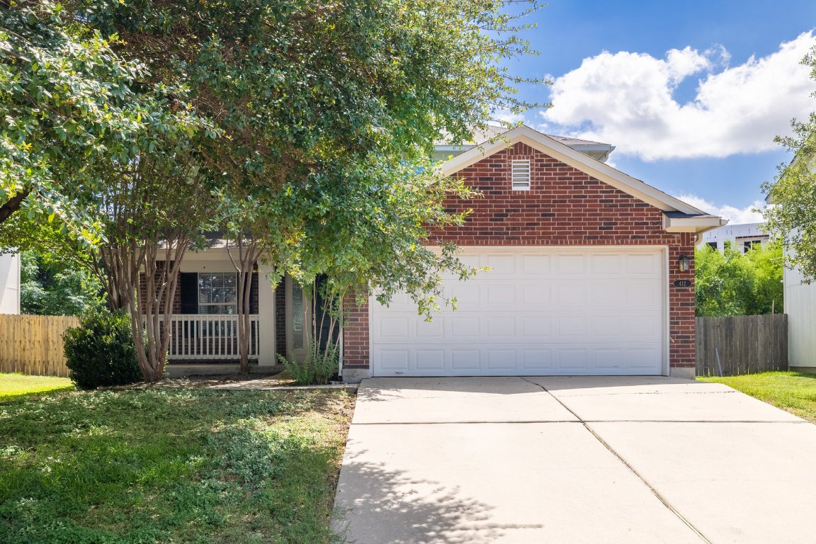 412 Colonial Park Boulevard Austin, TX 78745 - Photo 1 of 1 a front view of a house with a garage