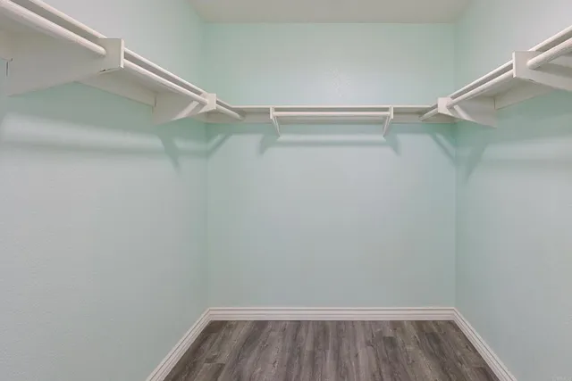 a view of an empty walk in closet