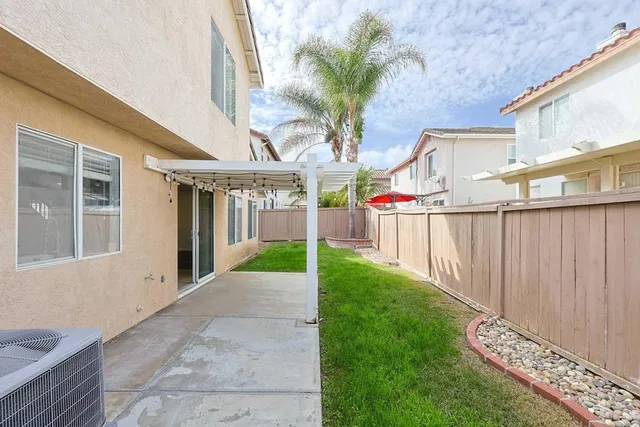 a view of a backyard with a garden