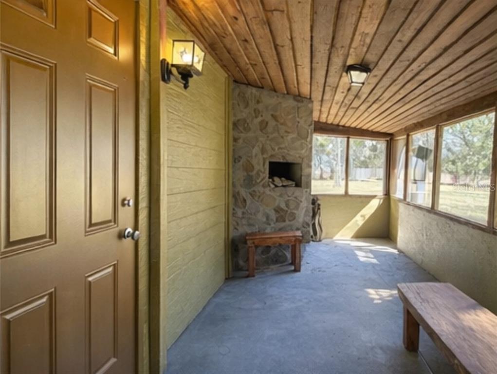 445 State Rte 415 Osteen, FL 32764 - Photo 14 of 25 a view of an outdoor space with porch and furniture