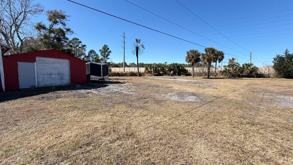 445 State Rte 415 Osteen, FL 32764 - Photo 25 of 25 a view of a backyard of a house