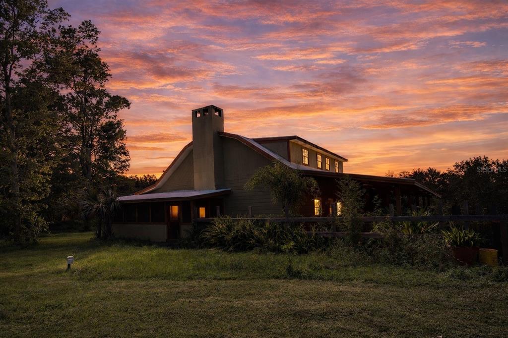 445 State Rte 415 Osteen, FL 32764 - Photo 4 of 14 a front view of a house with a yard
