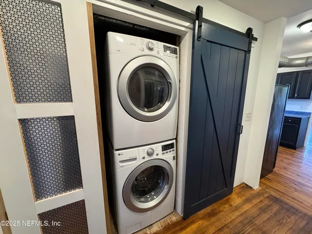 a utility room with dryer and washer