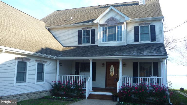 8563 Bay Road Pasadena, MD 21122 - Photo 2 of 25 Front yard and Beautiful White Porch.
