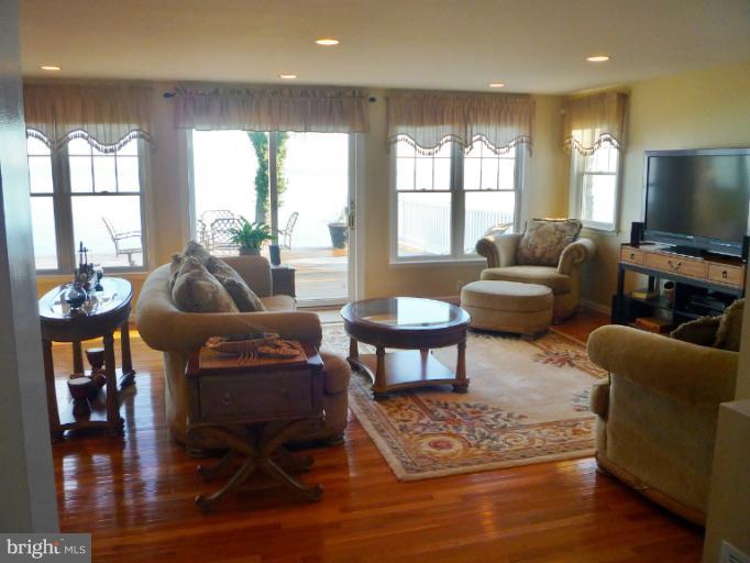 8563 Bay Road Pasadena, MD 21122 - Photo 11 of 25 First floor open design features stunning view.