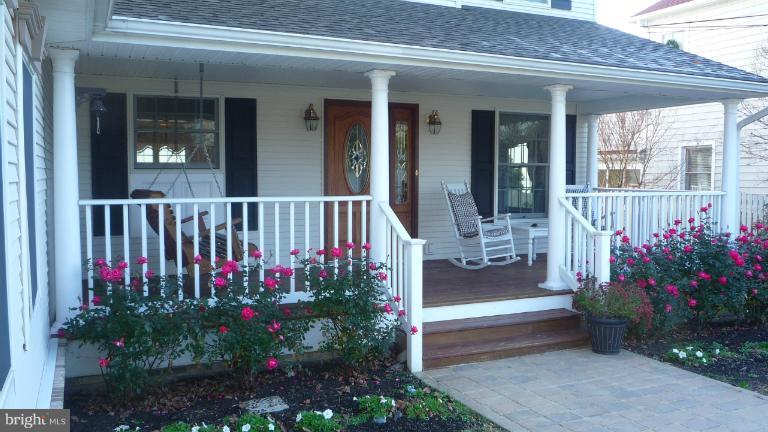 8563 Bay Road Pasadena, MD 21122 - Photo 3 of 25 Quaint White Porch front entrance to home.