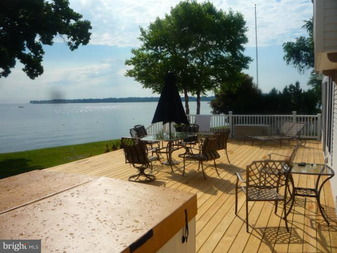 8563 Bay Road Pasadena, MD 21122 - Photo 23 of 25 Deck with hot tub for enjoyment.