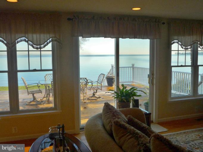 8563 Bay Road Pasadena, MD 21122 - Photo 10 of 25 Living Room with stunning water view.