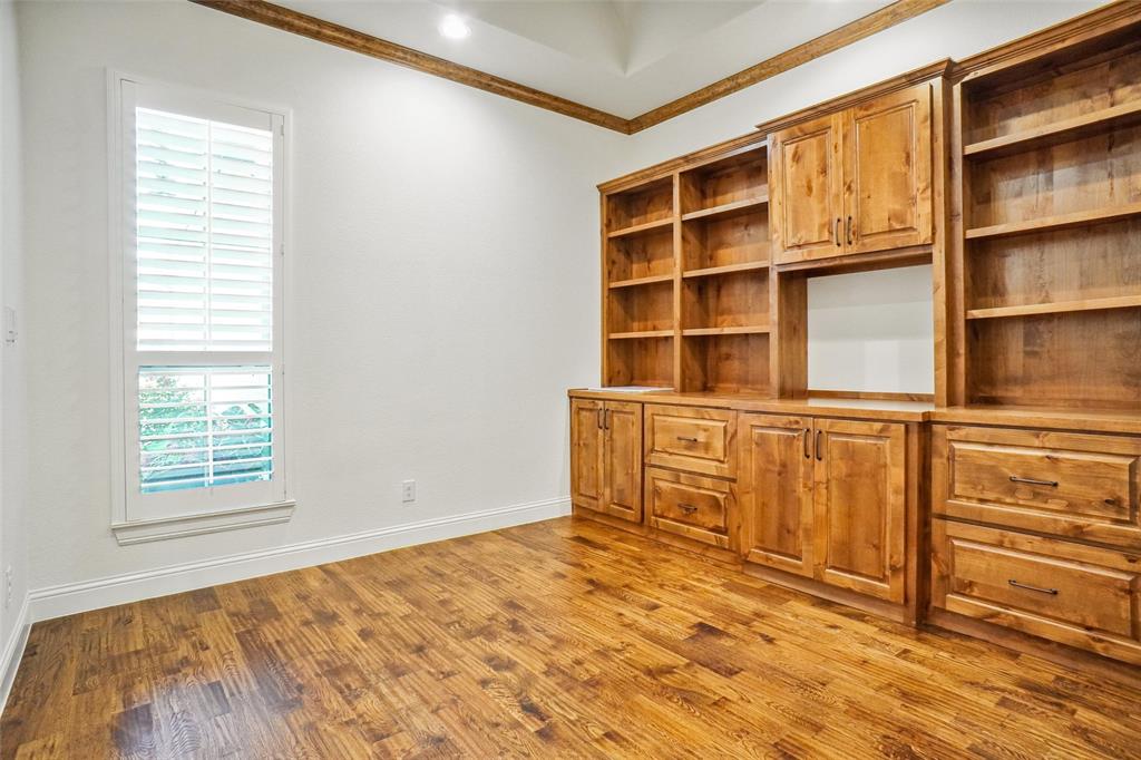 1208 Vly Rdg Drive Weatherford, TX 76087 - Photo 17 of 32 a view of an empty room with cabinet and a window
