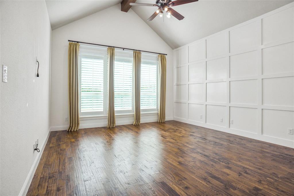 1208 Vly Rdg Drive Weatherford, TX 76087 - Photo 18 of 32 an empty room with wooden floor fan and windows