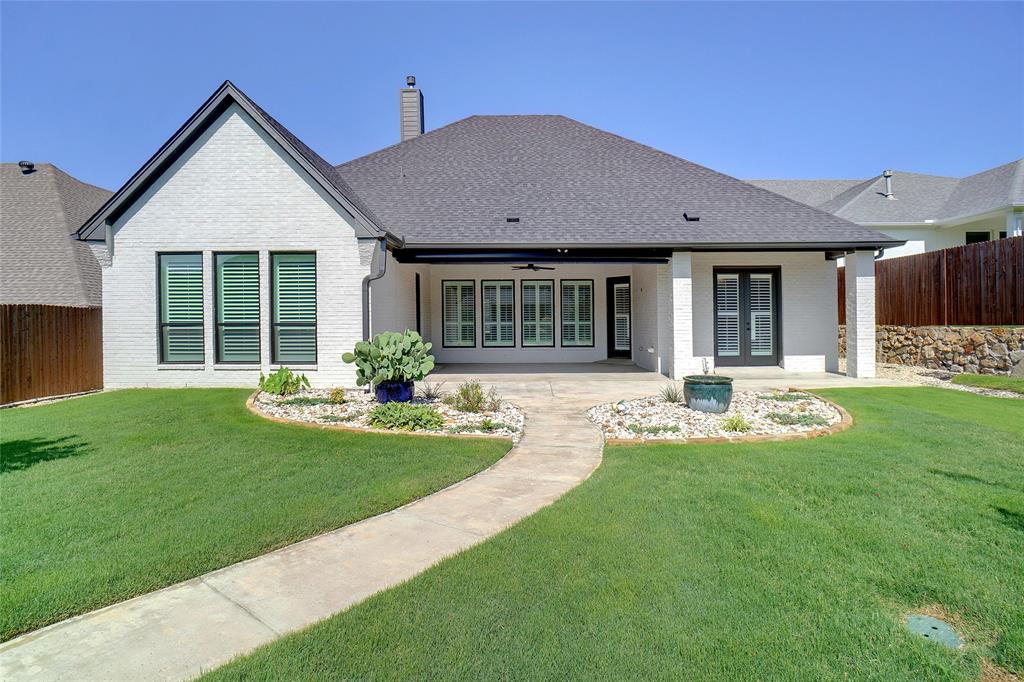 1208 Vly Rdg Drive Weatherford, TX 76087 - Photo 31 of 32 a view of a house with a yard and a porch
