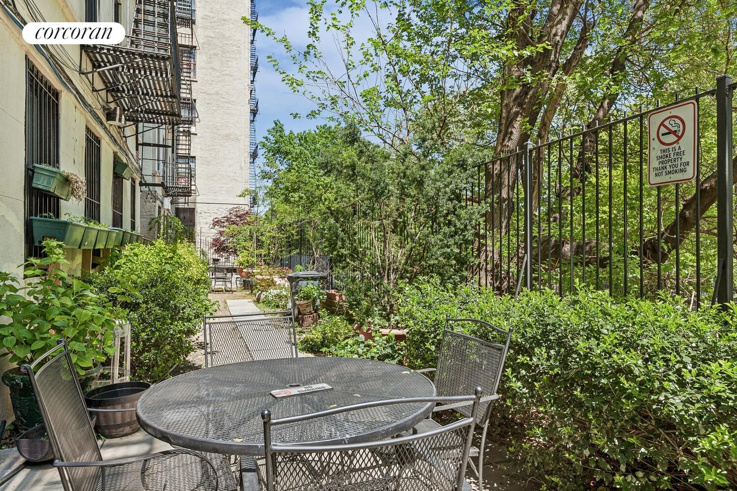 930 St Nicholas Avenue, Unit 53 Manhattan, NY 10032 - Photo 10 of 12 a view of outdoor space and yard