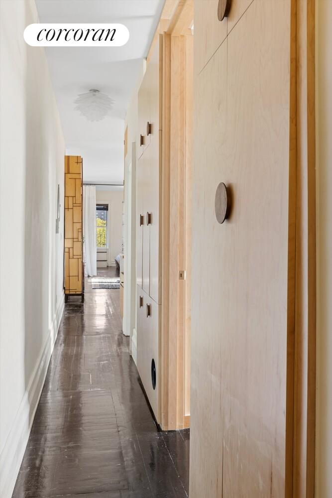 930 St Nicholas Avenue, Unit 53 Manhattan, NY 10032 - Photo 7 of 12 a view of a hallway with wooden floor