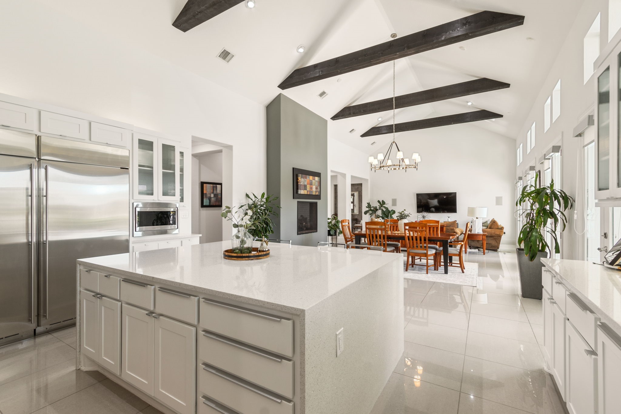 28518 Hoffman Spring Lane Fulshear, TX 77441 - Photo 12 of 50 Open concept gourmet chef's kitchen that blends elegance and practicality.