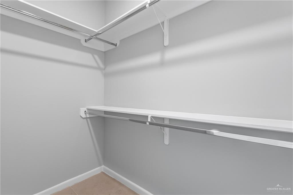 2612 Mockingbird Road, Unit 3 Weslaco, TX 78596 - Photo 9 of 11 a view of a room with racks on the wall