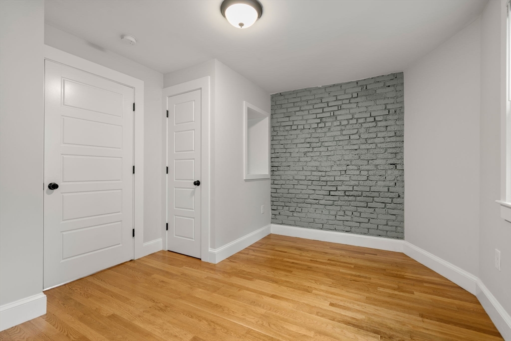 129 Sutherland Road, Unit A Boston, MA 02135 - Photo 26 of 38 a view of empty room