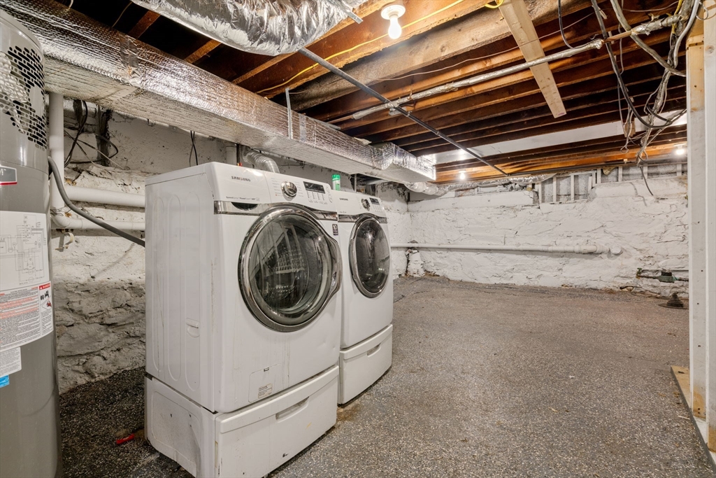 129 Sutherland Road, Unit A Boston, MA 02135 - Photo 33 of 38 a utility room with dryer and washer