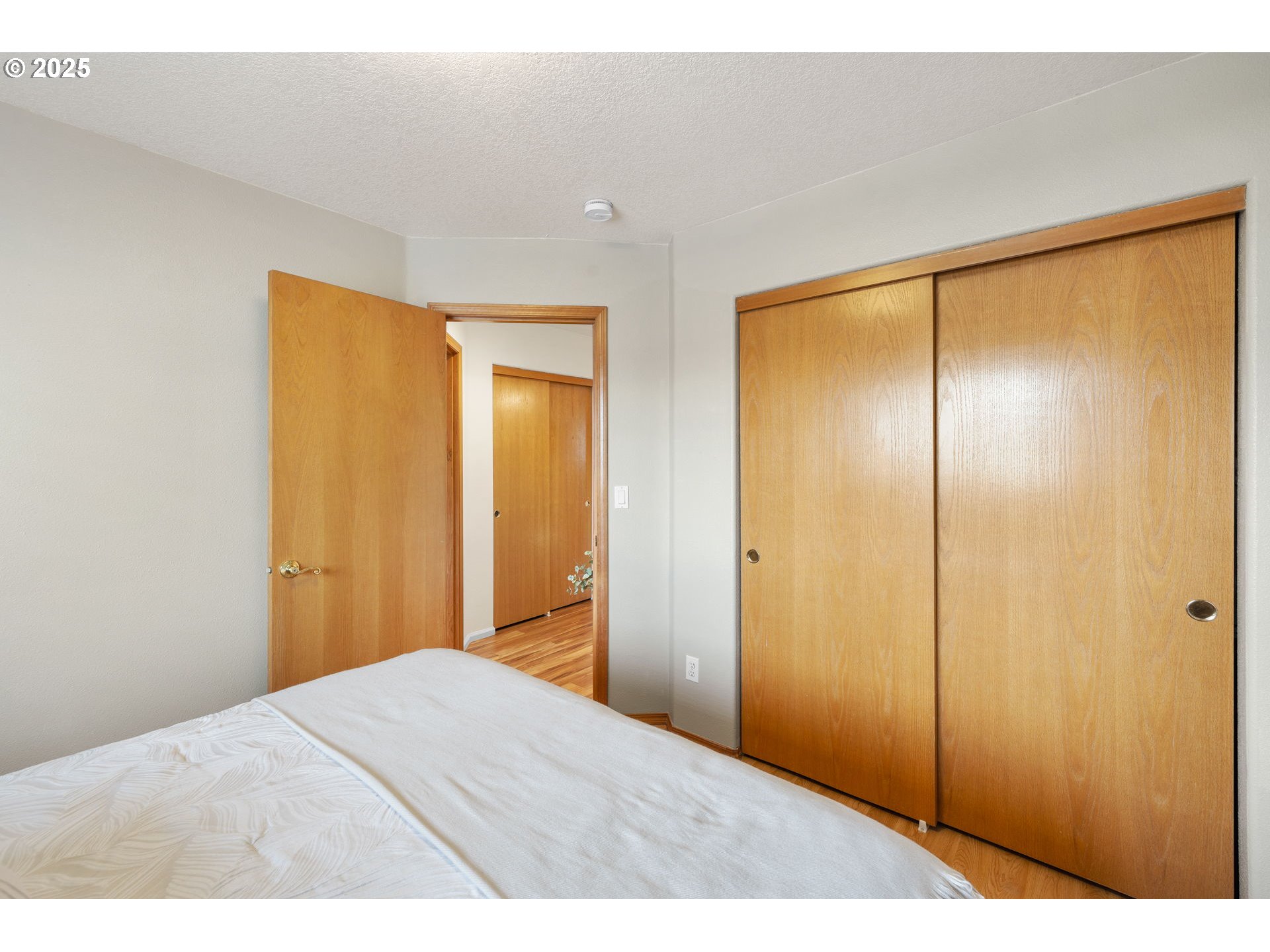 1021 Southwest 24th Street Troutdale, OR 97060 - Photo 20 of 34 a bedroom with a bed and a shower