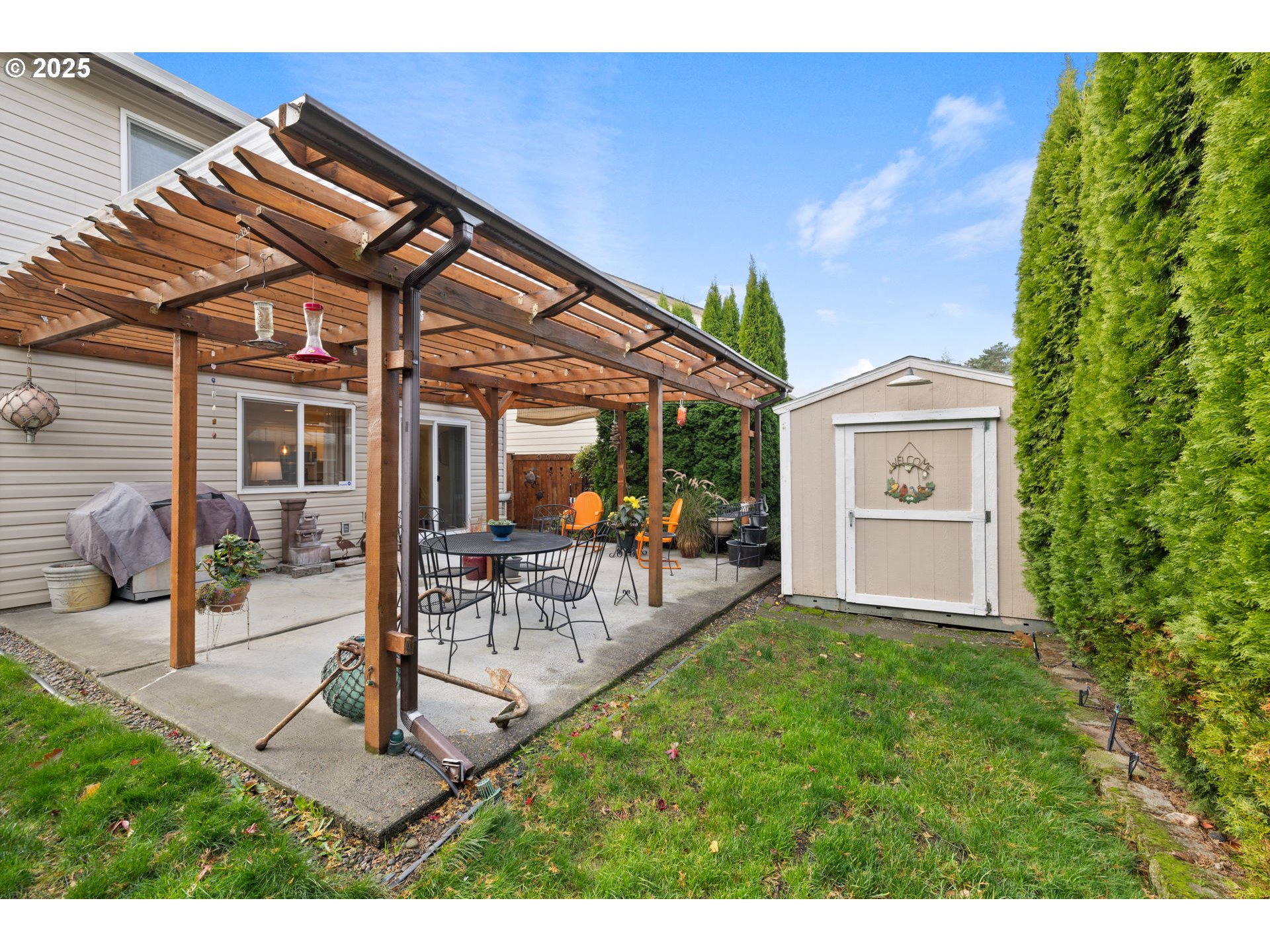 1021 Southwest 24th Street Troutdale, OR 97060 - Photo 27 of 34 a patio with table and chairs