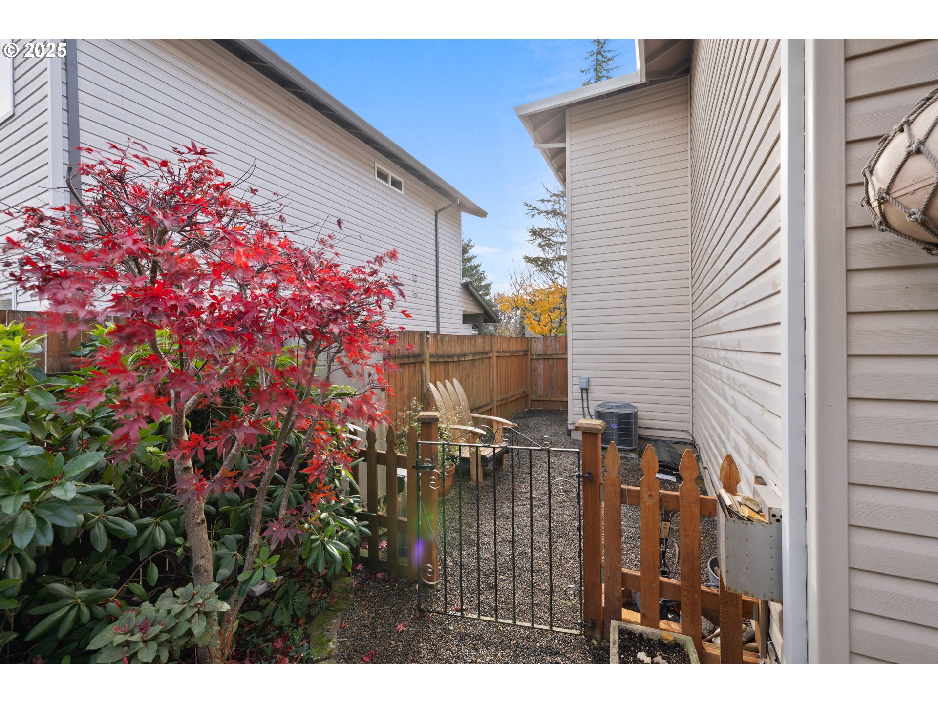 1021 Southwest 24th Street Troutdale, OR 97060 - Photo 30 of 34 a backyard of a house with chairs