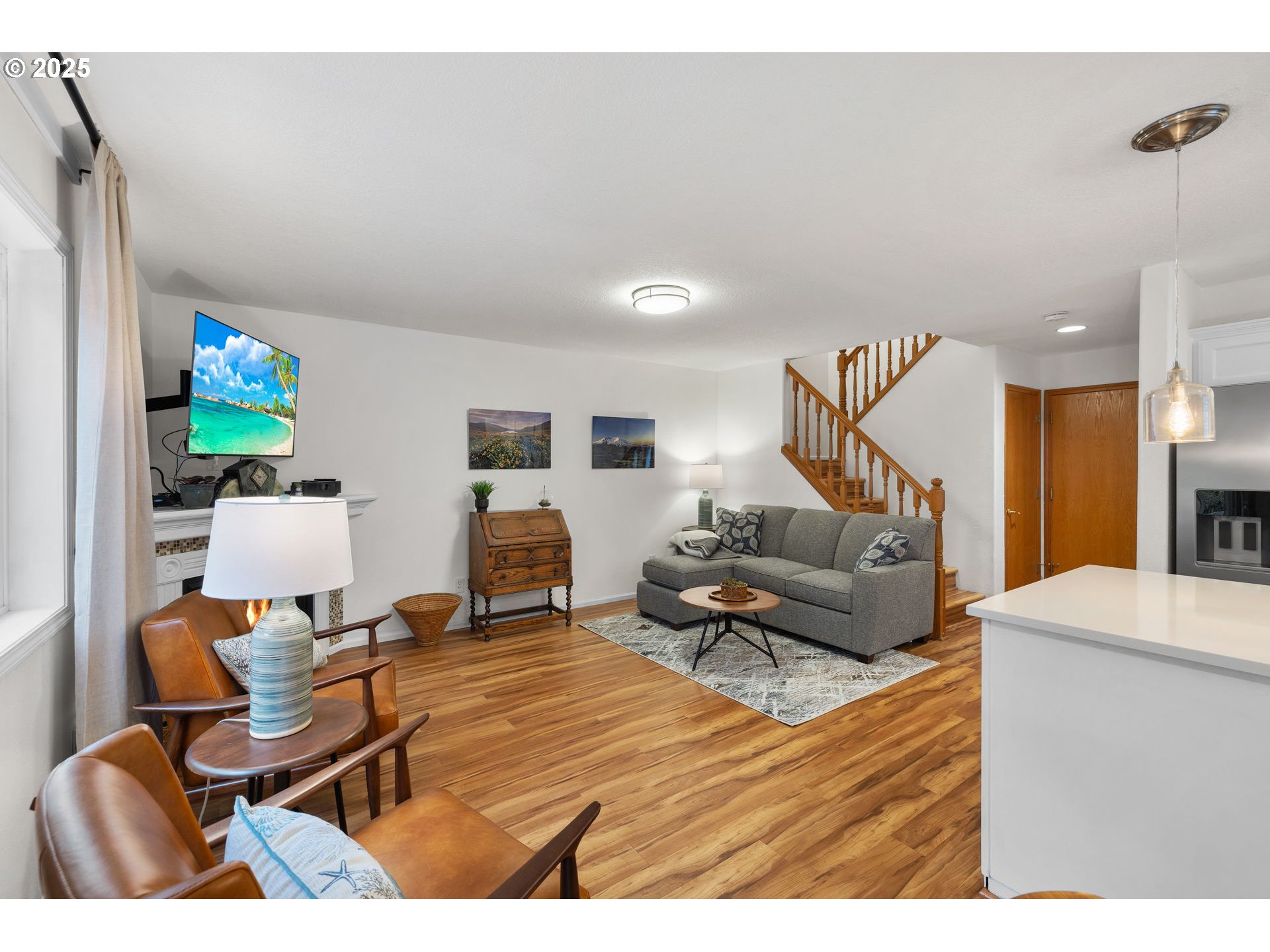 1021 Southwest 24th Street Troutdale, OR 97060 - Photo 6 of 34 a living room with furniture and a flat screen tv