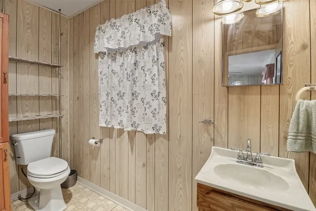 a view of a patio with chairs and a table