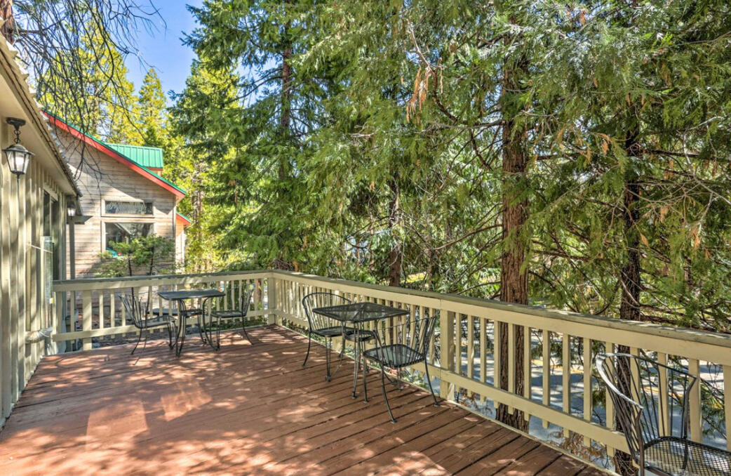 42036 Tollhouse Road Shaver Lake, CA 93664 - Photo 25 of 30 a view of a two chairs and table in the balcony