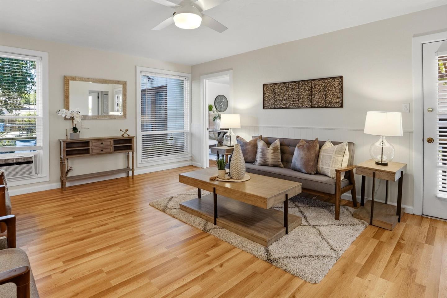16899 Kennedy Road Los Gatos, CA 95032 - Photo 11 of 61 a living room with furniture and a wooden floor