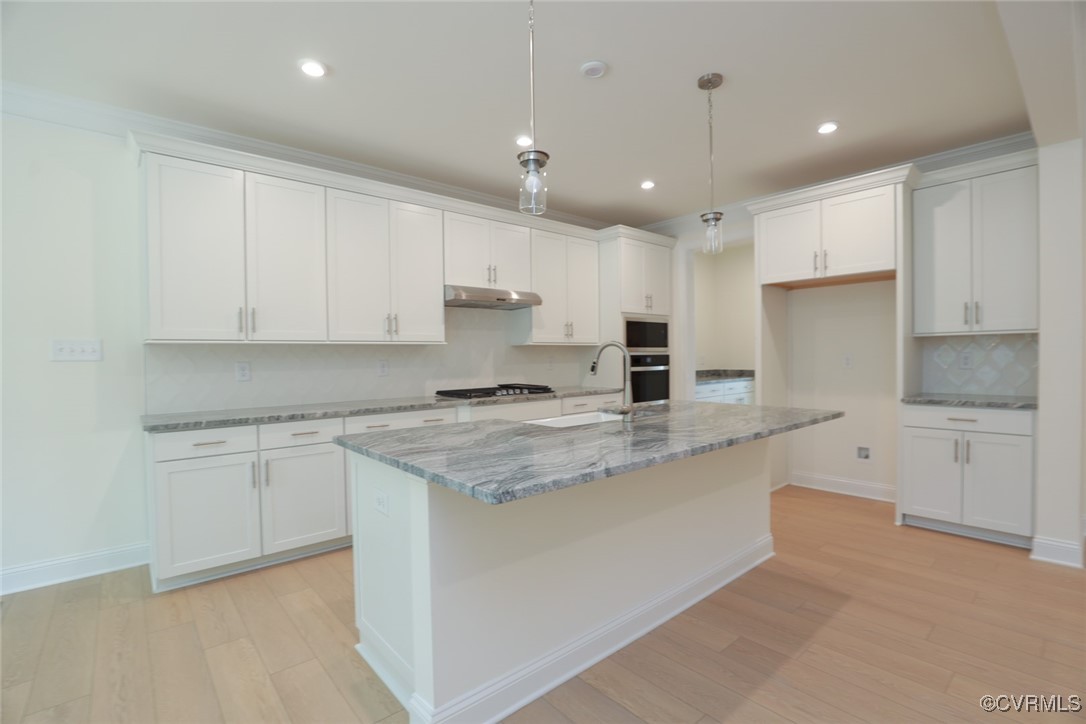 8512 Freebridge Road Chesterfield, VA 23832 - Photo 7 of 36 Kitchen features granite countertops, island, butl