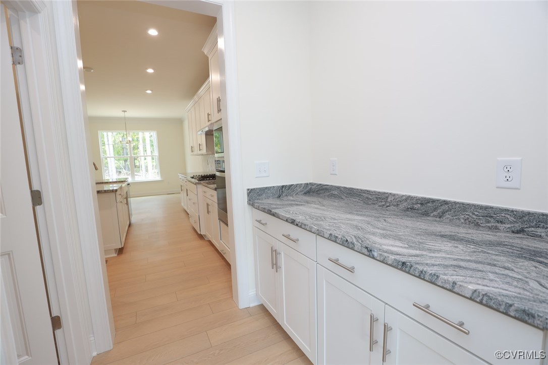 8512 Freebridge Road Chesterfield, VA 23832 - Photo 9 of 36 Kitchen features granite countertops, island, butl
