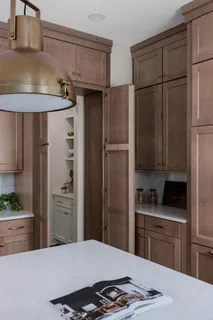 a kitchen with stainless steel appliances a refrigerator and a stove