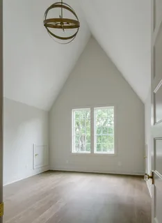 a bathroom with a shower and a sink