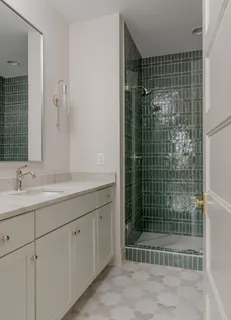 an empty room with windows and closet