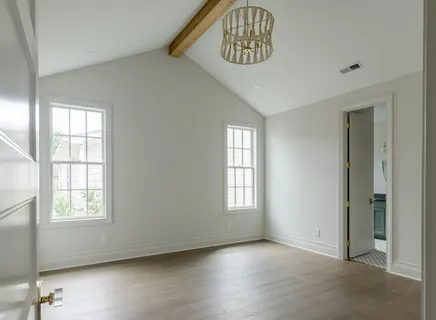 a bathroom with a toilet a sink and a mirror