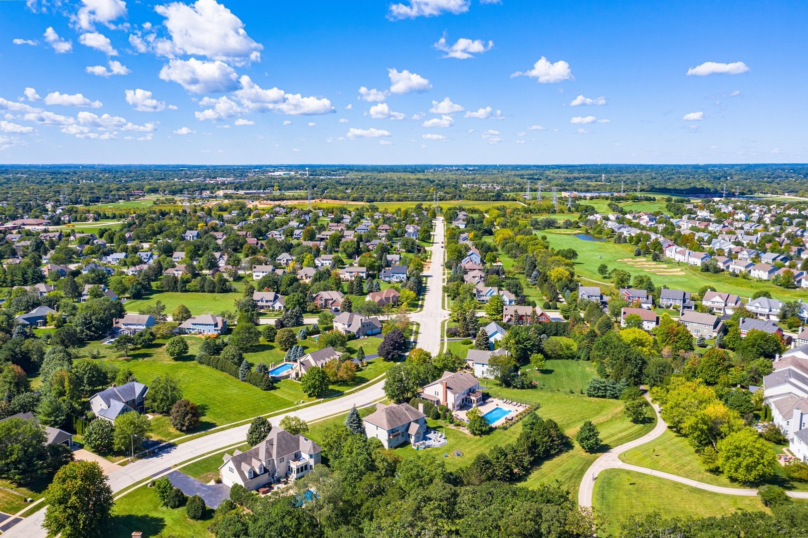 1211 Mink Trail Cary, IL 60013 - Photo 6 of 7 a city view with lots of flowers