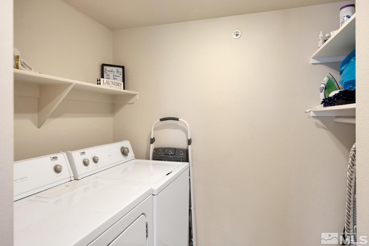 6850 Sharlands Avenue, Unit N2081 Reno, NV 89523 - Photo 12 of 27 a utility room with dryer and washer