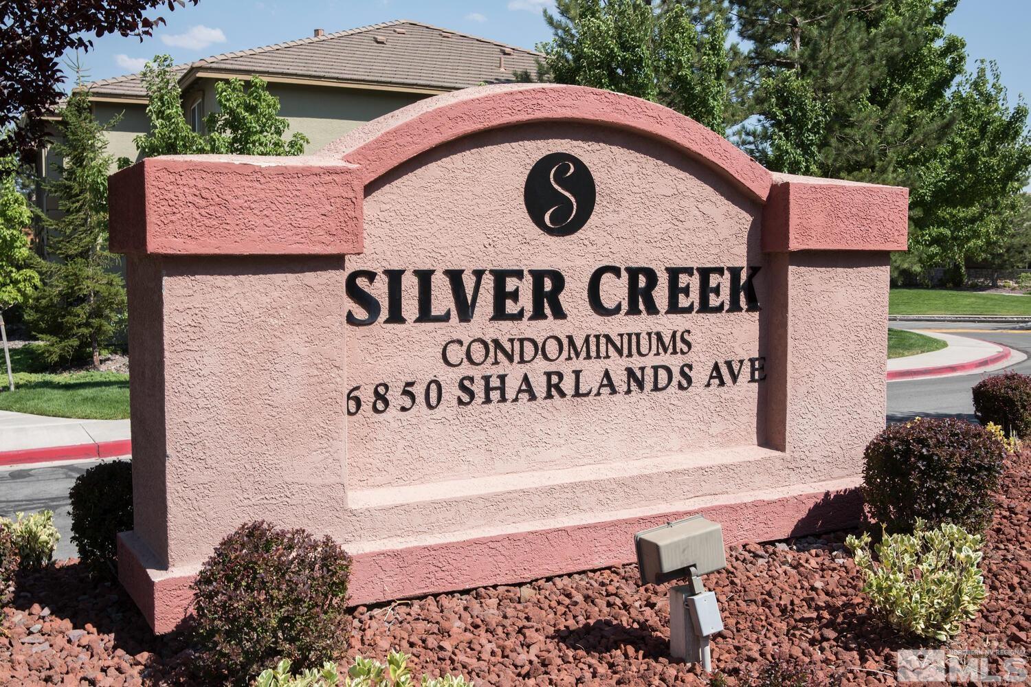 6850 Sharlands Avenue, Unit N2081 Reno, NV 89523 - Photo 22 of 27 a sign that is on the side of a building