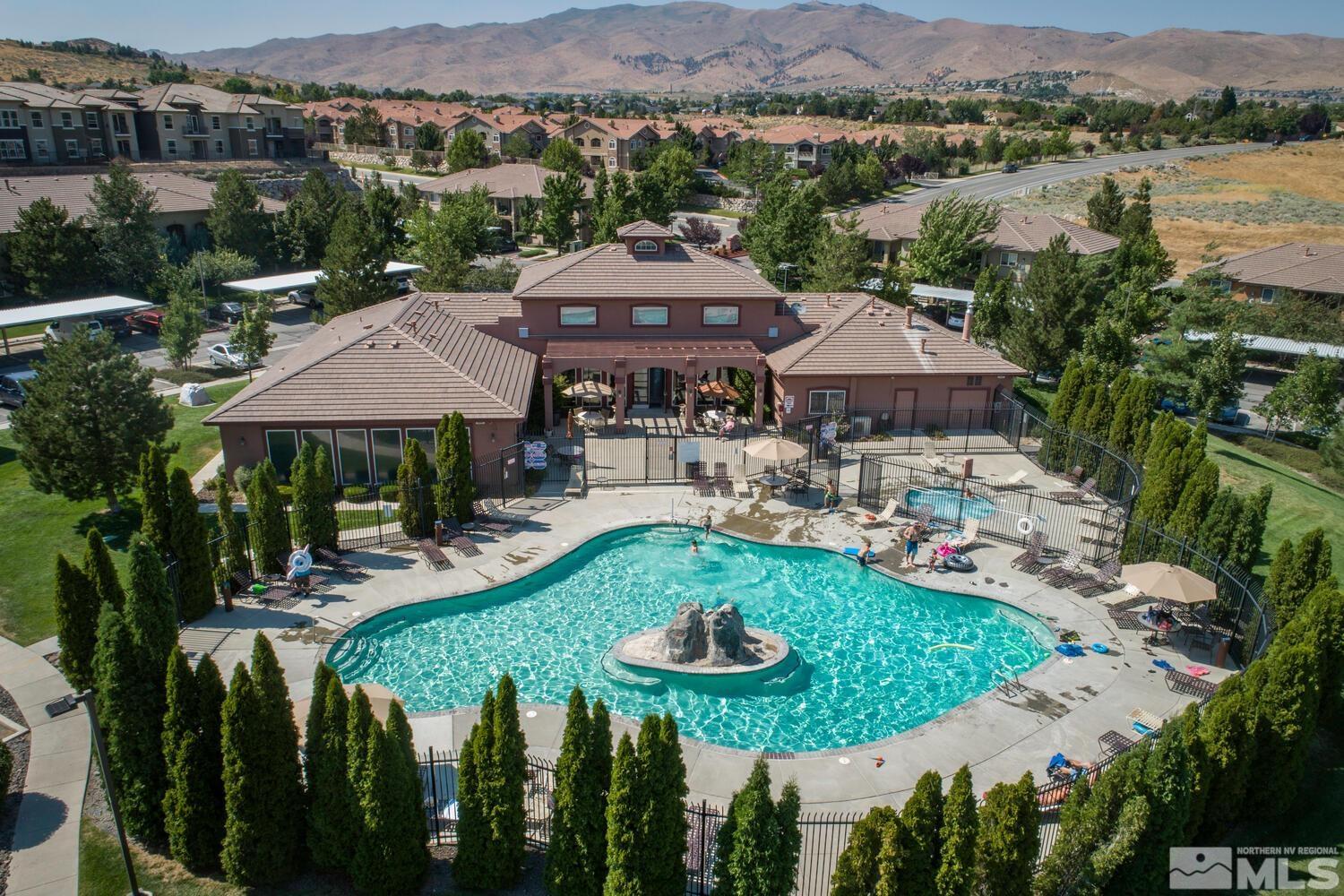 6850 Sharlands Avenue, Unit N2081 Reno, NV 89523 - Photo 24 of 27 an aerial view of a house with garden space and lake view