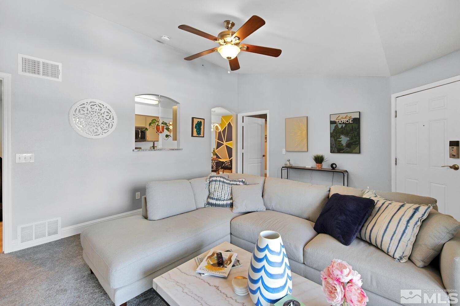 6850 Sharlands Avenue, Unit N2081 Reno, NV 89523 - Photo 6 of 27 a living room with furniture