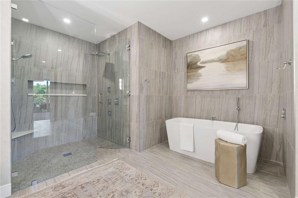 2520 Peachtree Road, Unit 603 Atlanta, GA 30305 - Photo 40 of 91 a bathroom with a shower and a tub