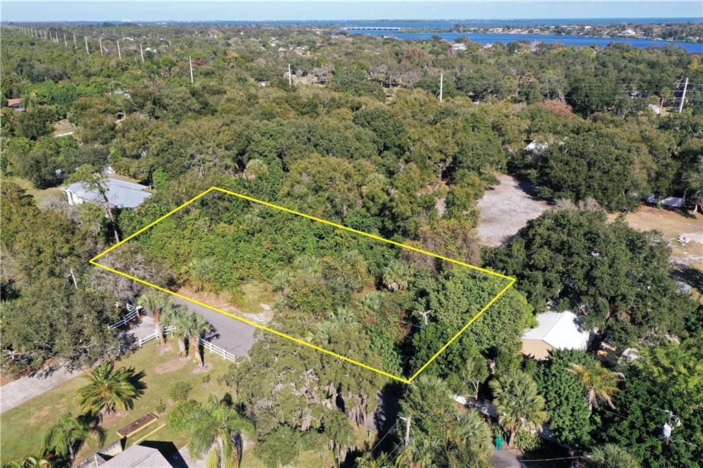 0 Oak Trail Micco, FL 32976 - Photo 1 of 20 an aerial view of a house with a yard
