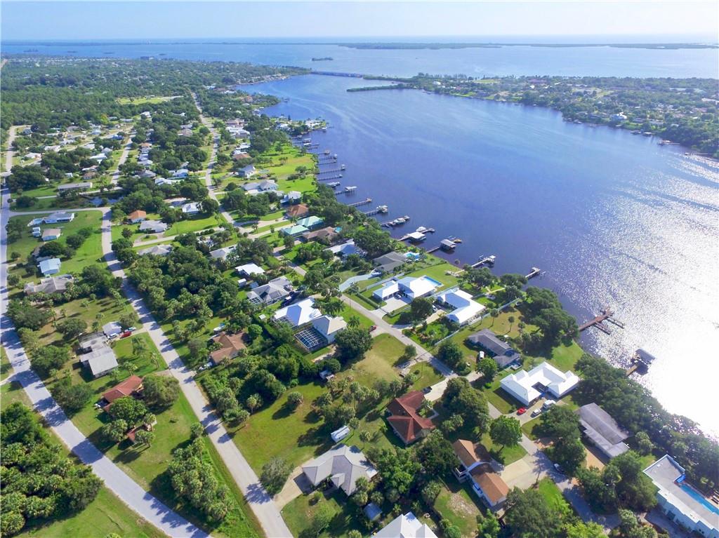 0 Oak Trail Micco, FL 32976 - Photo 16 of 20 a view of a lake with a city