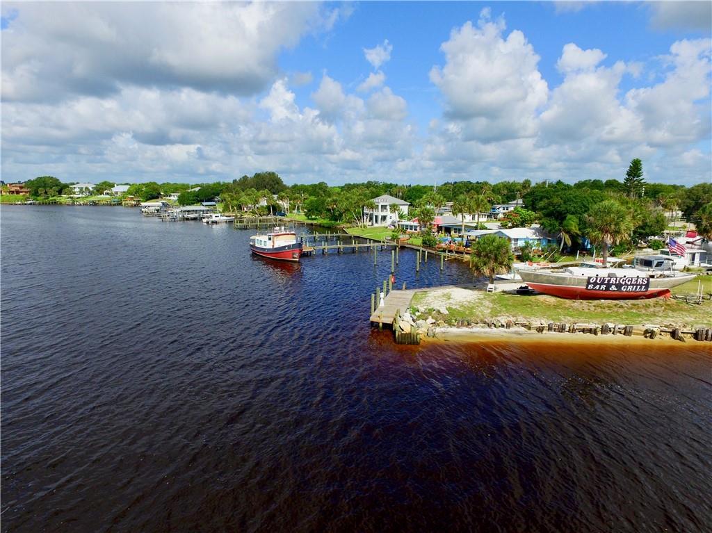 0 Oak Trail Micco, FL 32976 - Photo 17 of 20 a view of a lake with a big yard