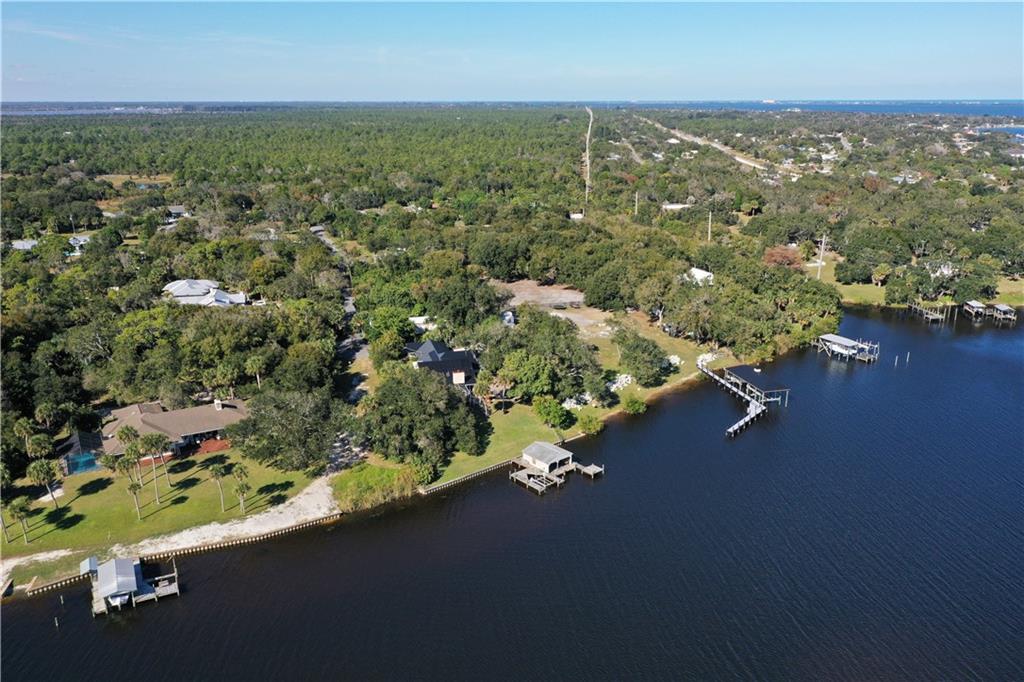 0 Oak Trail Micco, FL 32976 - Photo 10 of 20 an aerial view of residential houses with outdoor space and trees