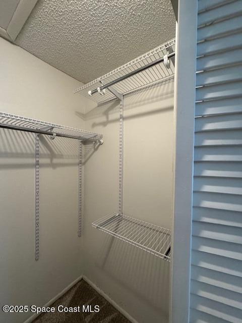 4721 Sisson Road Titusville, FL 32780 - Photo 13 of 29 a view of a room with racks on the wall