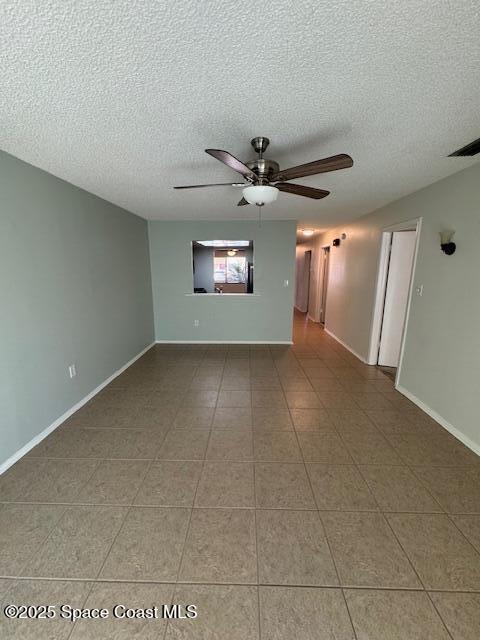 4721 Sisson Road Titusville, FL 32780 - Photo 23 of 29 a view of a livingroom with a ceiling fan and window
