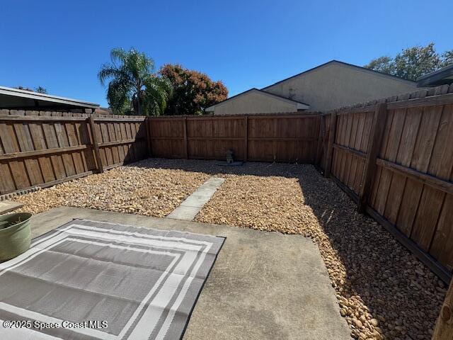 4721 Sisson Road Titusville, FL 32780 - Photo 28 of 29 a view of backyard with wooden fence