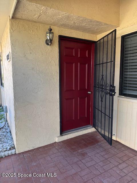 4721 Sisson Road Titusville, FL 32780 - Photo 29 of 29 a view of a wooden door